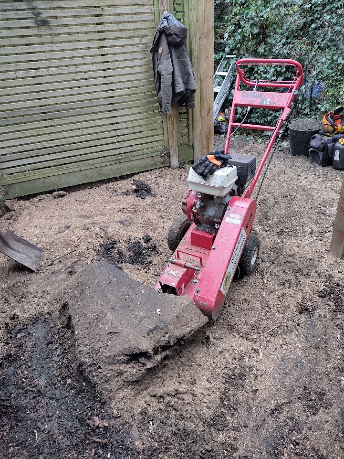 Big stump - Little machine :-) Narrow access job - customer delighted :-)