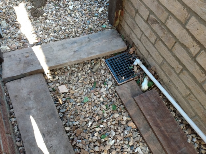 A bit of levelling up to get through the gate, and protect the plastic piping. :-) For all your stump grinding needs, big or small - just give us a call :-)